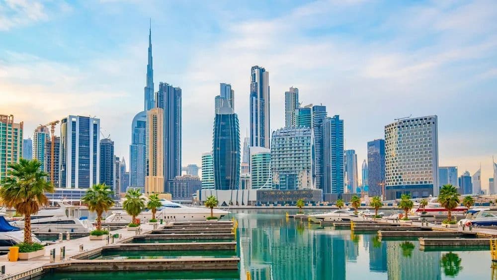 Business Bay skyline with Dubai Canal, modern office towers, and Burj Khalifa view